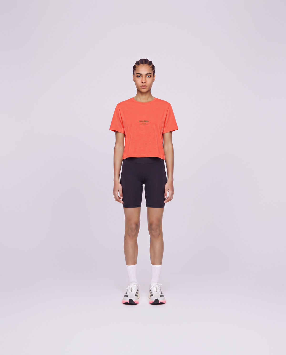 Training Dept. triblend cropped t-shirt in coral on model — front view — Vista 2