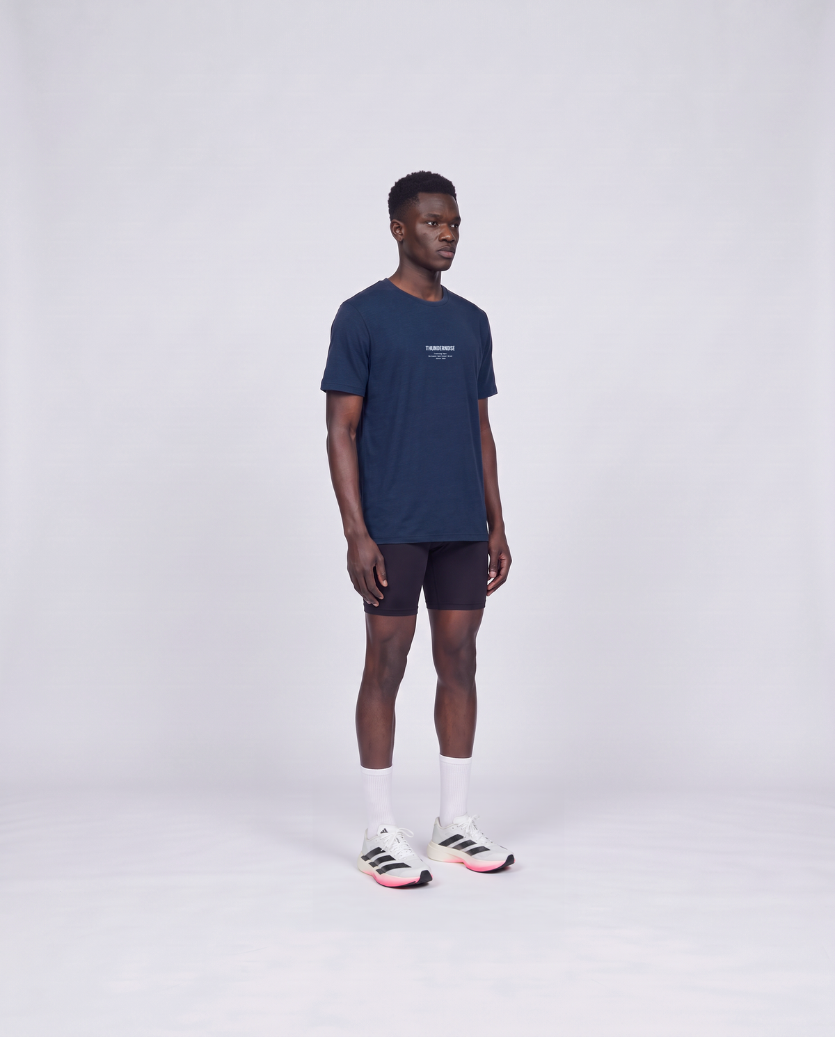 Training Dept. triblend t-shirt in french navy heather on model — three-quarter view — View 3