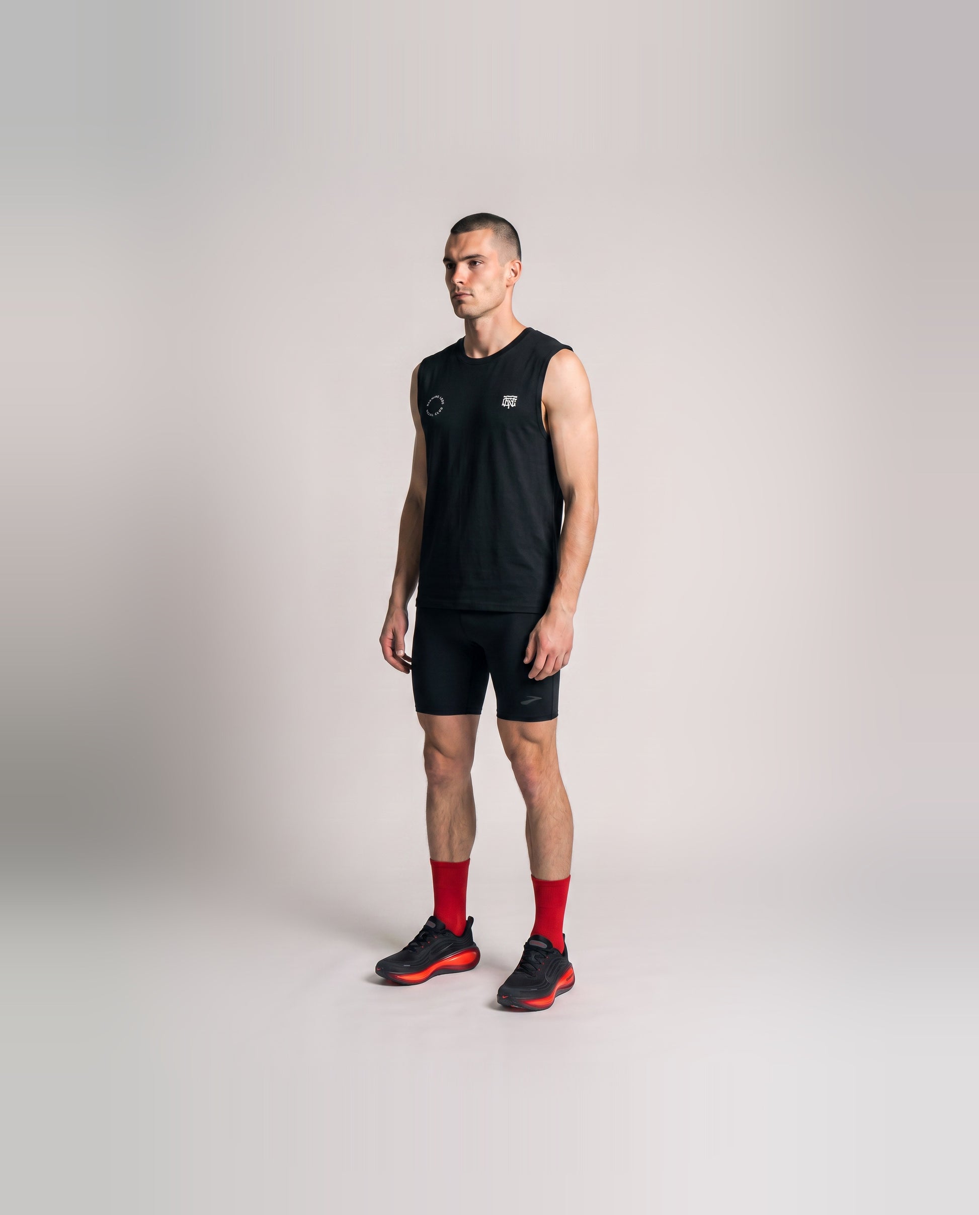 Burning Legs Social Club Tank Top Black — model three quarter