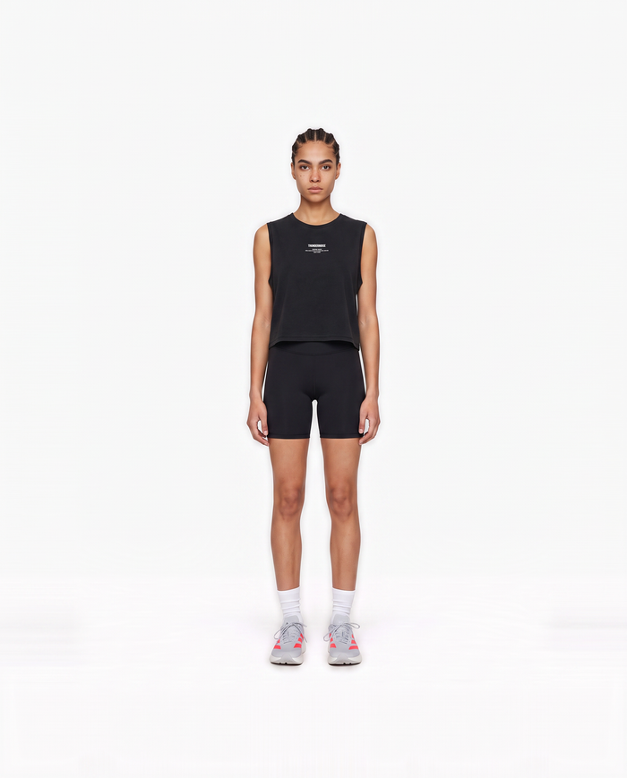 Model wearing the Today Was My Rest Day cropped tank top in black — front view with the compact Thundernoise chest mark in white