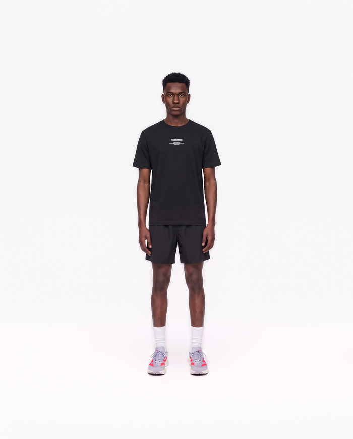 Model wearing the Today Was My Rest Day t-shirt in black — front view with the compact Thundernoise chest mark in white