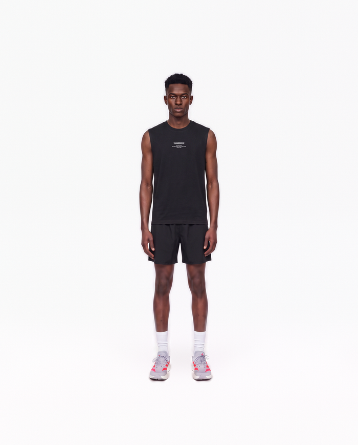 Model wearing the Today Was My Rest Day tank top in black — front view with the compact Thundernoise chest mark in white