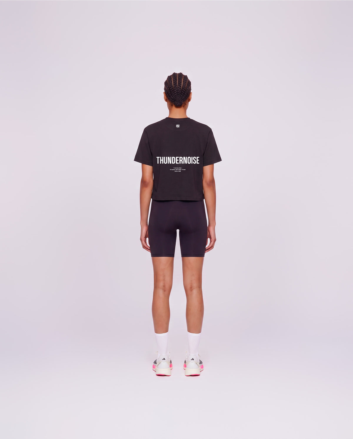 Training Dept. triblend cropped t-shirt in black on model — back view — Vista 4
