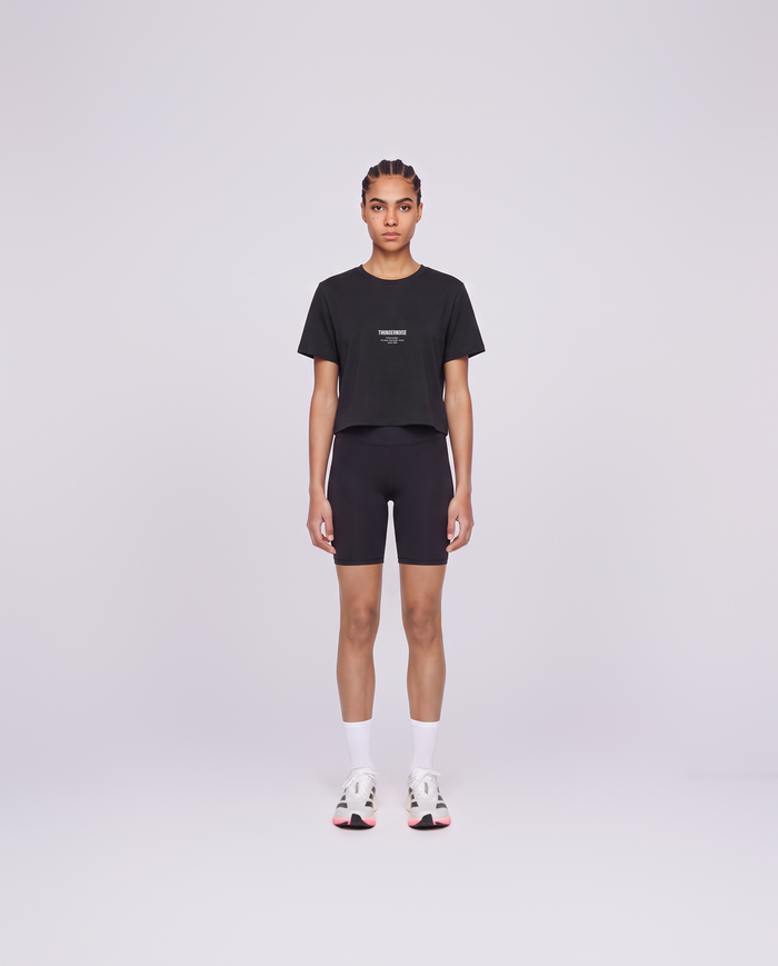 Training Dept. triblend cropped t-shirt in black on model — front view