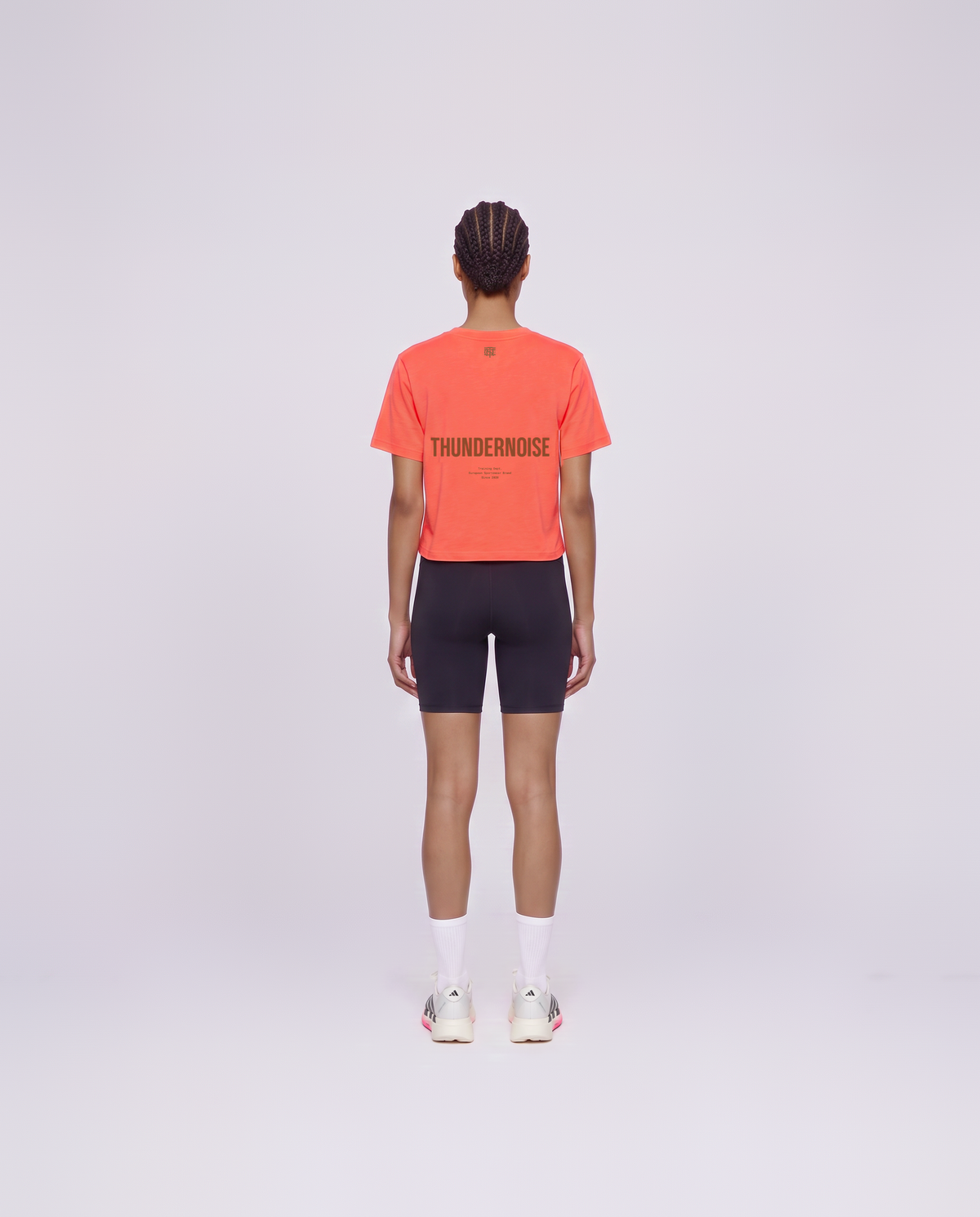 Training Dept. triblend cropped t-shirt in coral on model — back view — Vista 4
