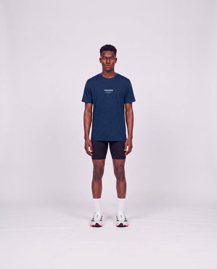 Training Dept. triblend t-shirt in french navy heather on model — front view
