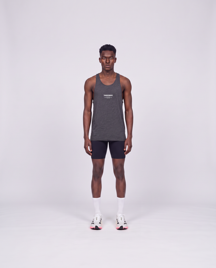 Training Dept. triblend tank top in dark grey heather on model — front view